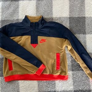 Nike tan, blue, red track top. Never worn!